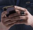 Ring that connects to mobile phone makes calls and makes payments